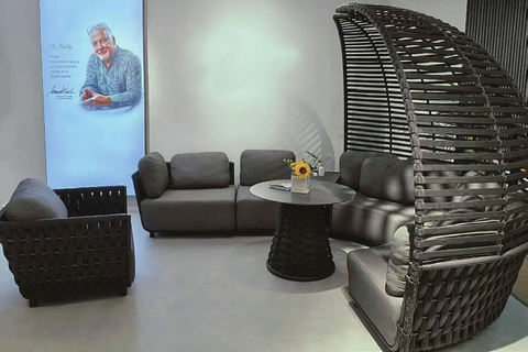 semi-circular outdoor sofa set with armchair